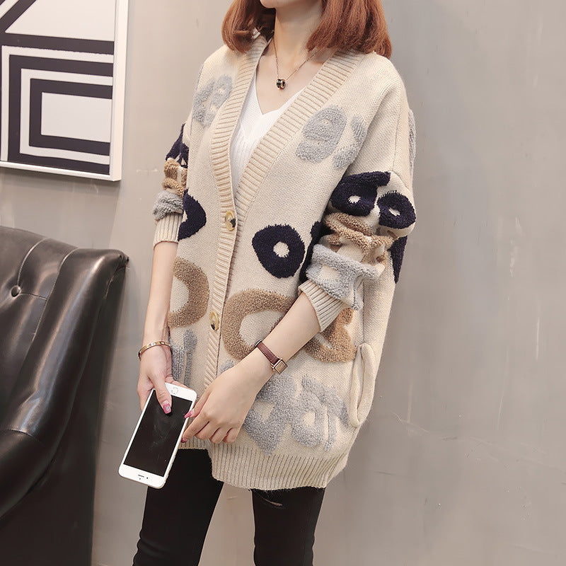 Cardigan dames en grosse maille avec motif accrocheur et grands boutons Chic und Still