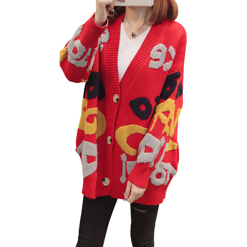 Cardigan dames en grosse maille avec motif accrocheur et grands boutons Chic und Still