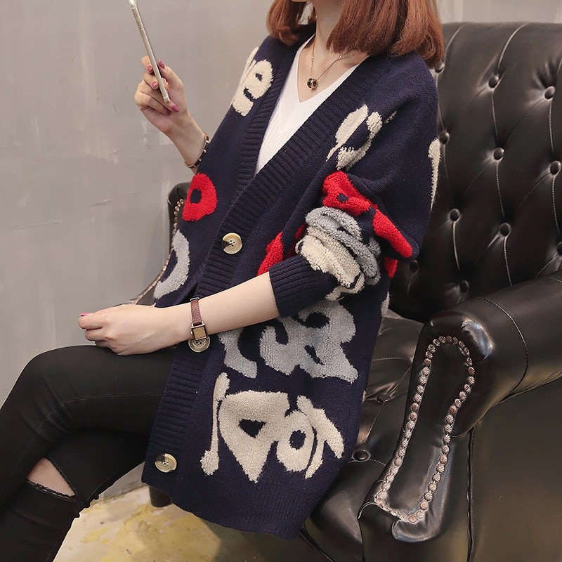 Cardigan dames en grosse maille avec motif accrocheur et grands boutons Chic und Still