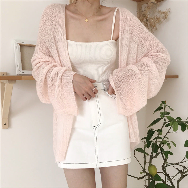 Robe de plage aérienne pour femmes avec des manches larges et un tissu décoratif Chic und Stil