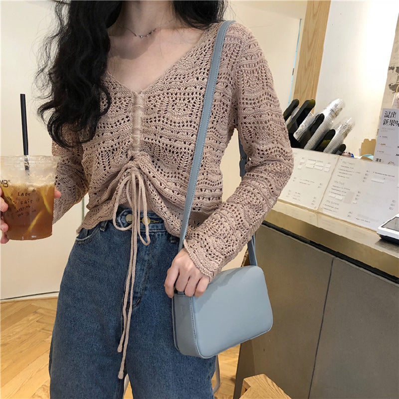 Pull en tricot pour femmes avec un motif de trous décoratif et un cordon réglable Chic und Stil
