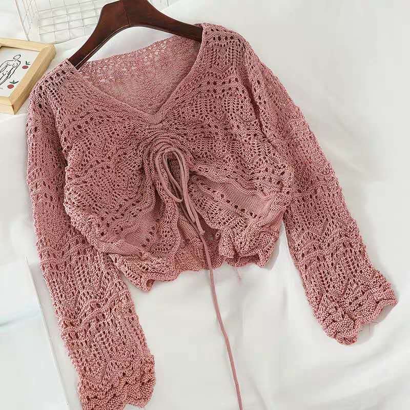 Pull en tricot pour femmes avec un motif de trous décoratif et un cordon réglable Chic und Stil