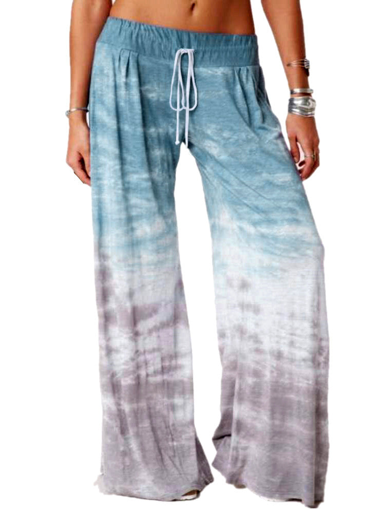 Wide beach pants for women with elastic waist and trendy batik design Chic und Stil