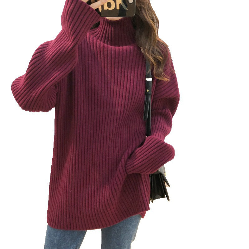 Chunky knit pullover for women with high collar and fine ribbed structure Chic and Style