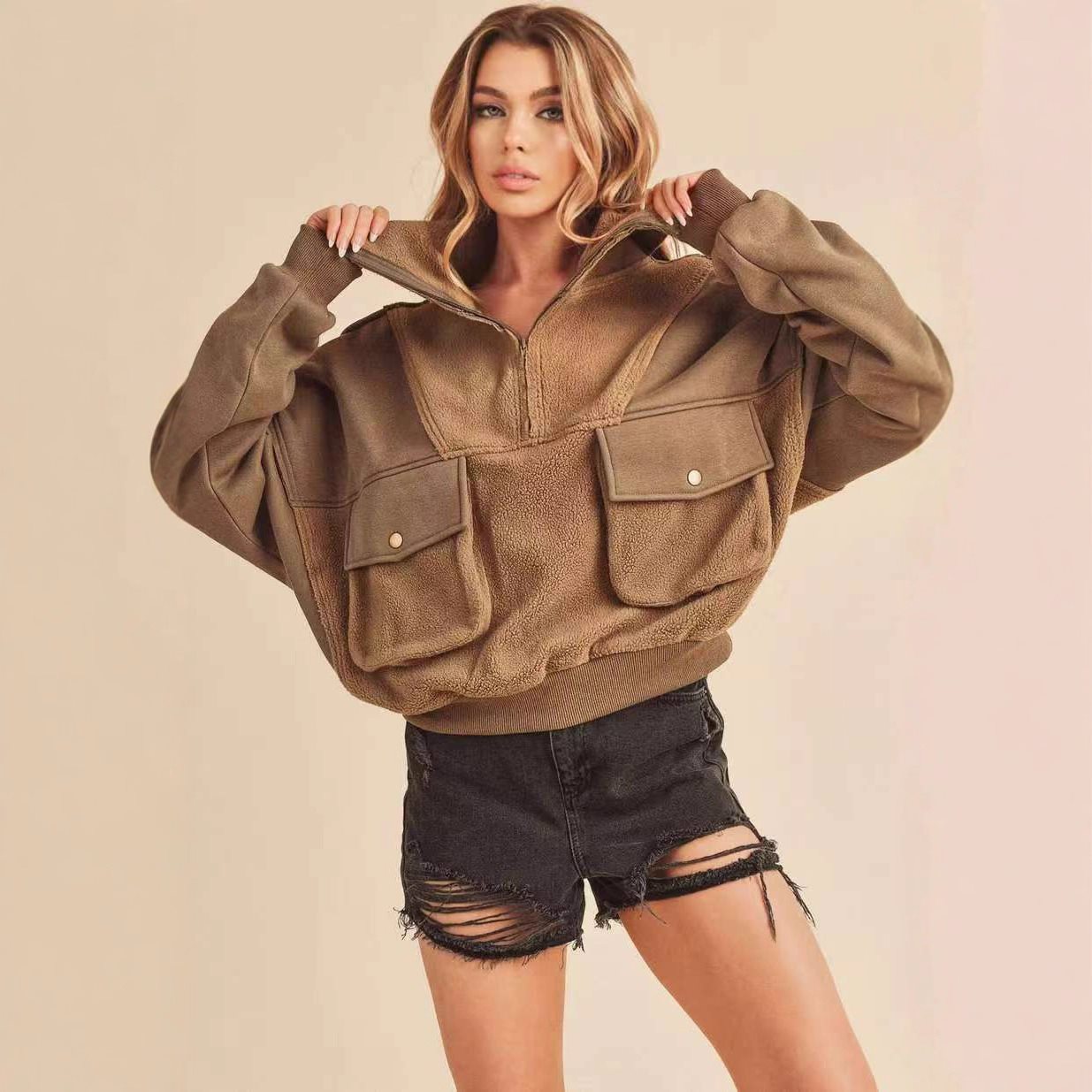 Dames Pull en fleece sportif avec zip et poche Chic und Stil