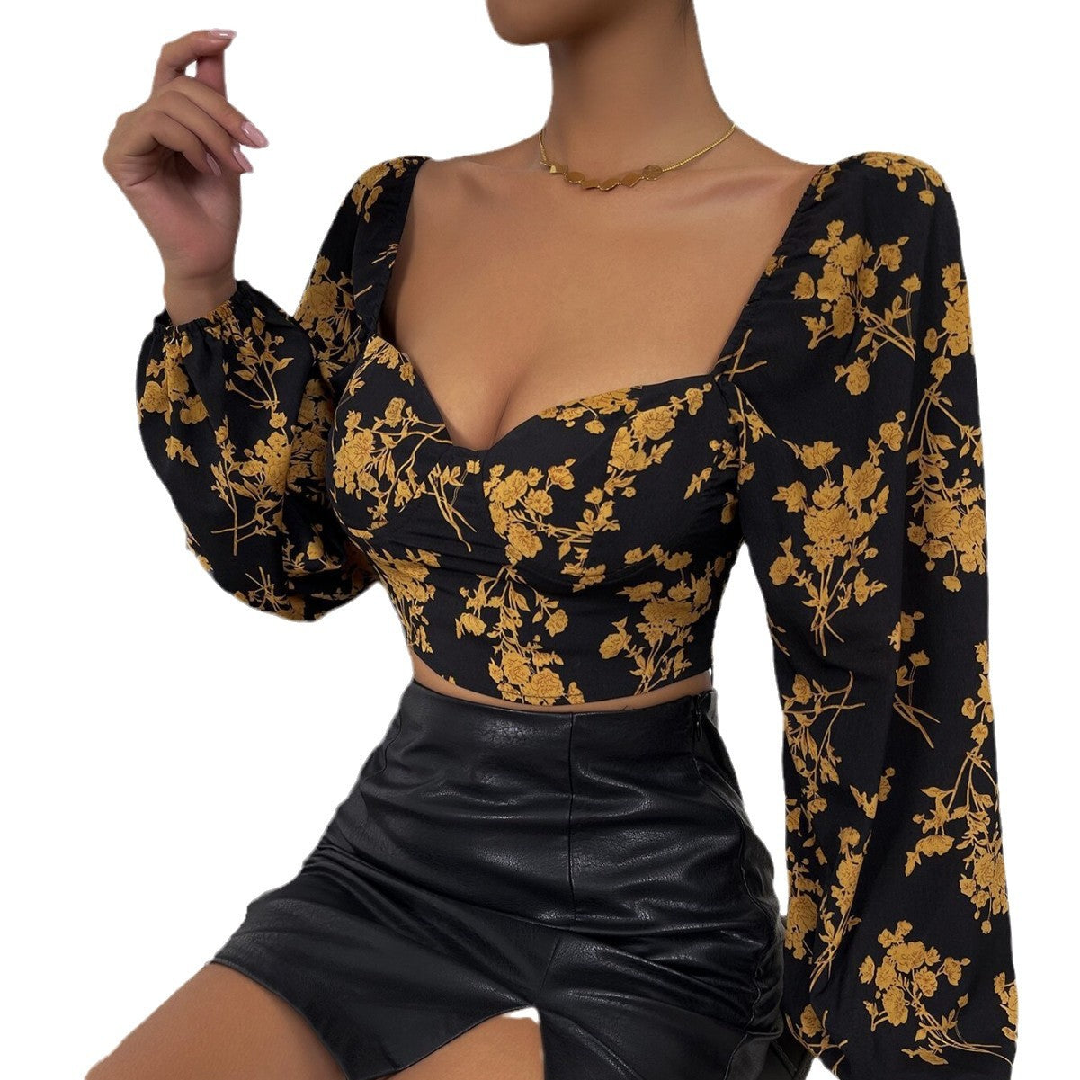 Haut court pour femmes avec motif floral et élégante manche bouffante Chic & Stil