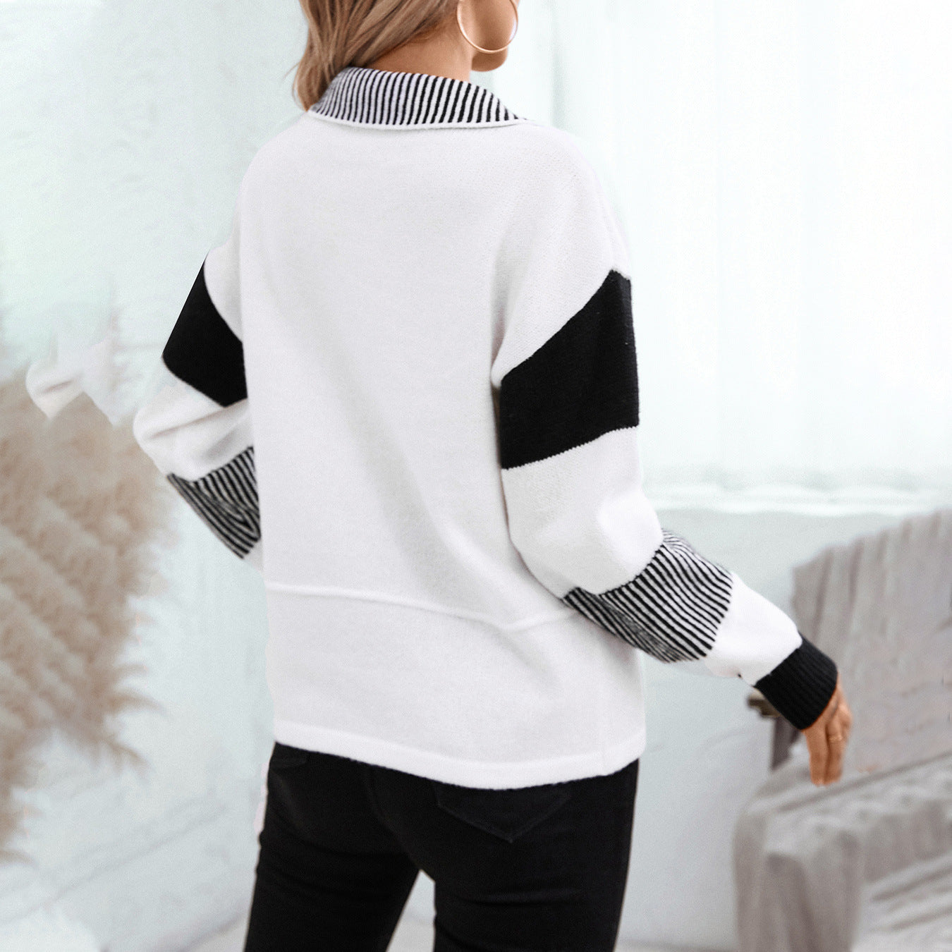 Pull féminin tendance avec col polo et rayures contrastées Chic und Stil