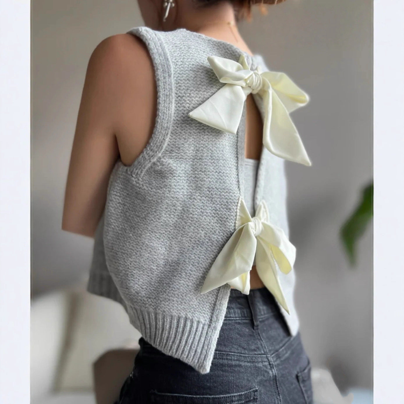 Gilet sans manches en tricot pour femmes avec des nœuds décoratifs au dos Chic und Stil
