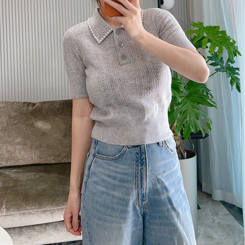 Top polo en tricot texturé pour femme avec détail en perles Chic und Stil