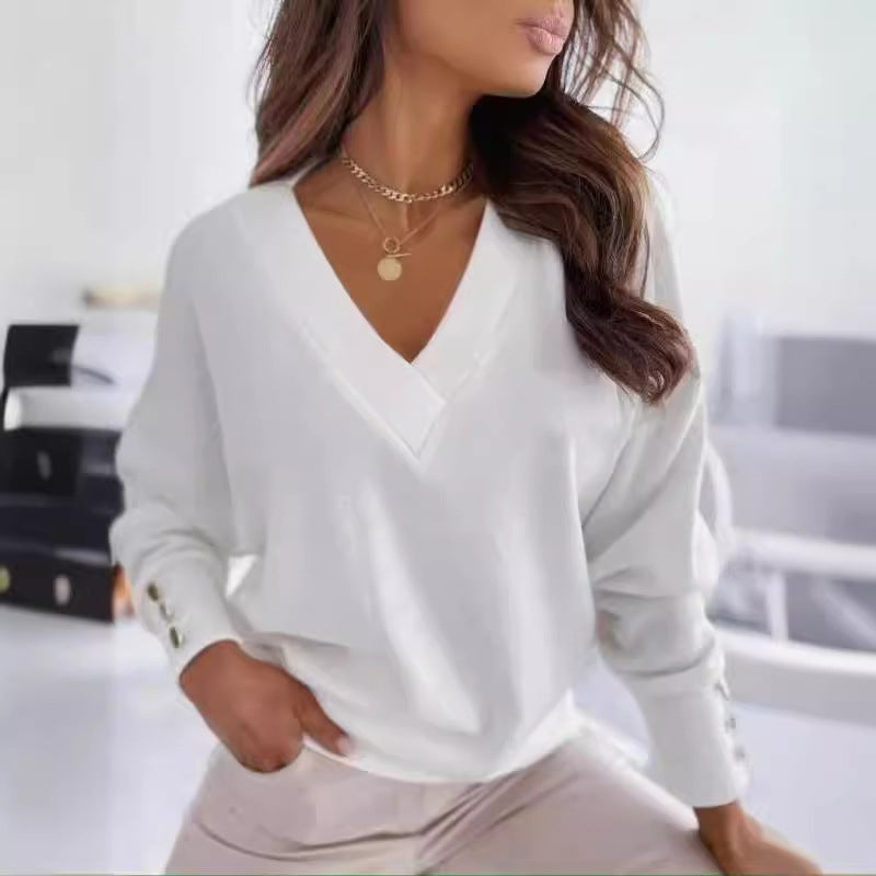 Pull élégant pour femmes à col en V avec des détails de boutons stylés Chic und Stil