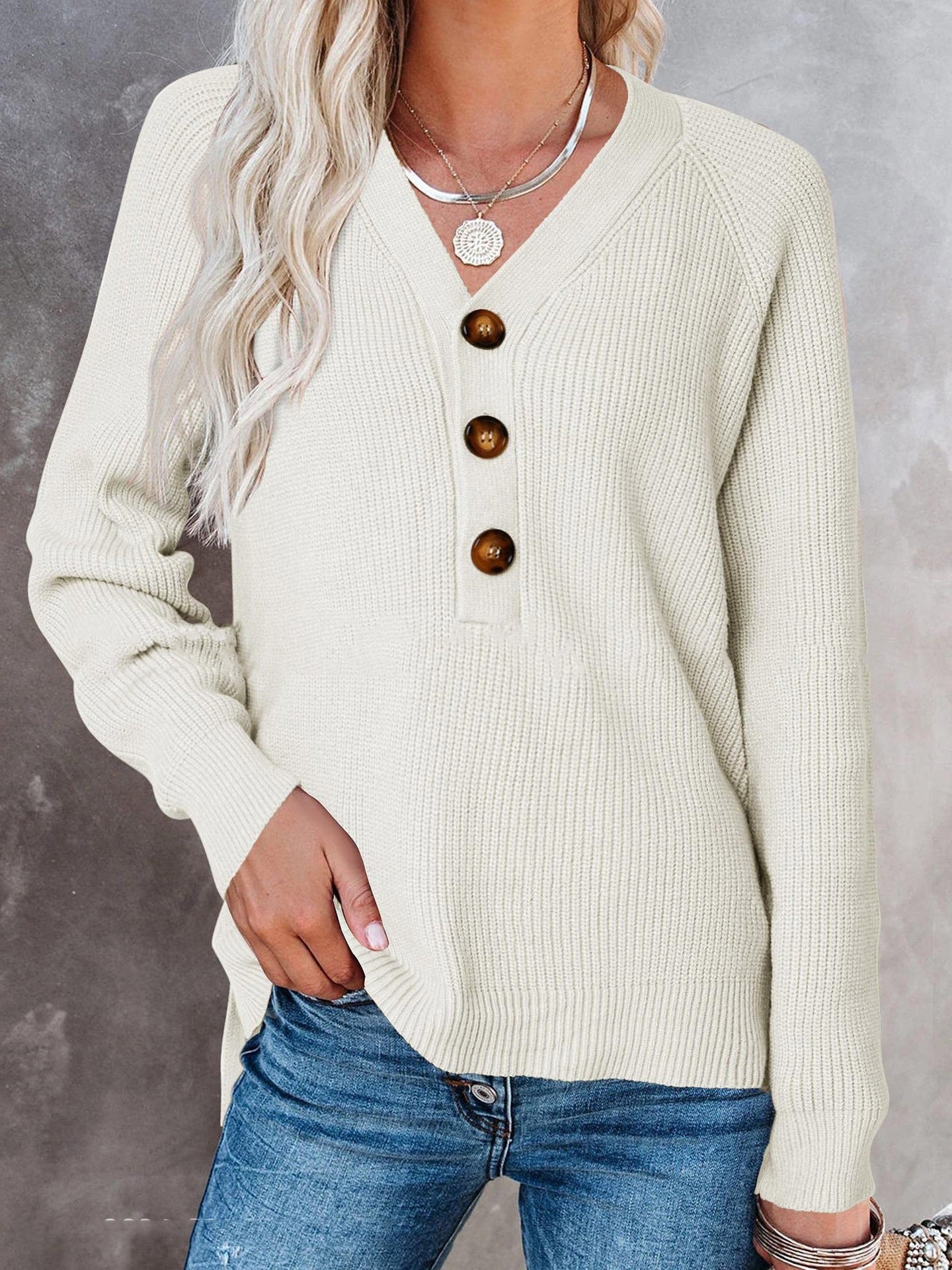 Pull tricot femmes avec décolleté en V et détails en boutons Chic und Stil
