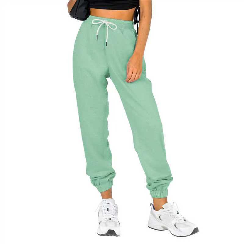 Pantalon d'entraînement pour femme avec taille élastique et coupe décontractée Chic und Stil