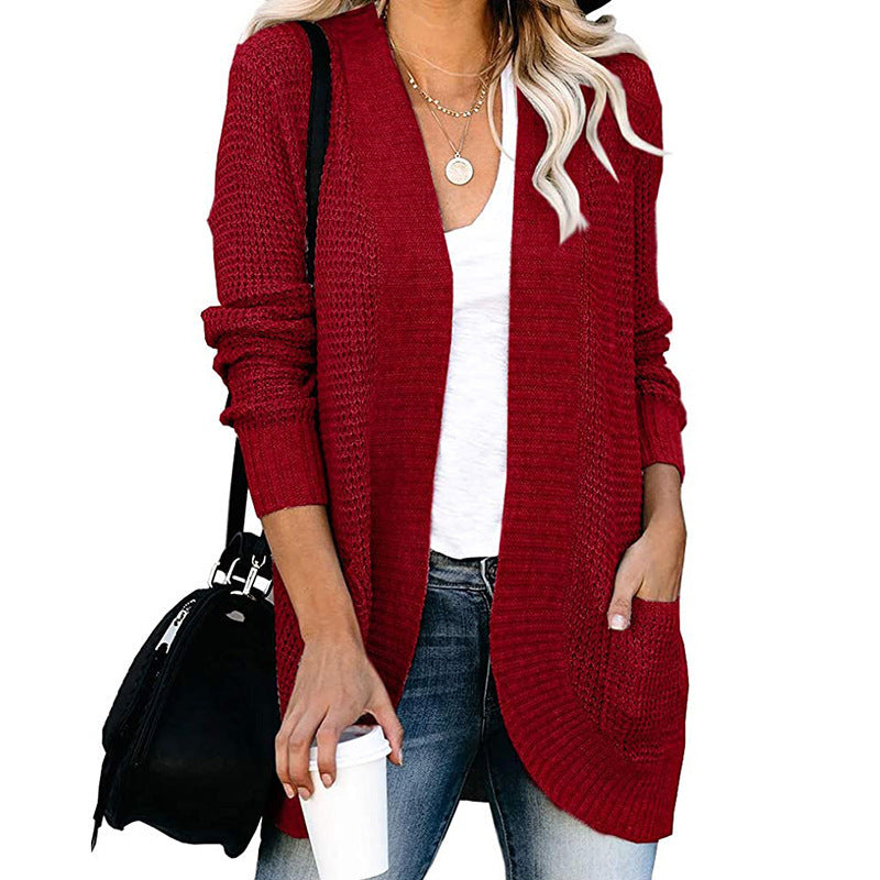 Veste en tricot pour femmes avec un motif de tricot moderne et des poches pratiques Chic und Stil