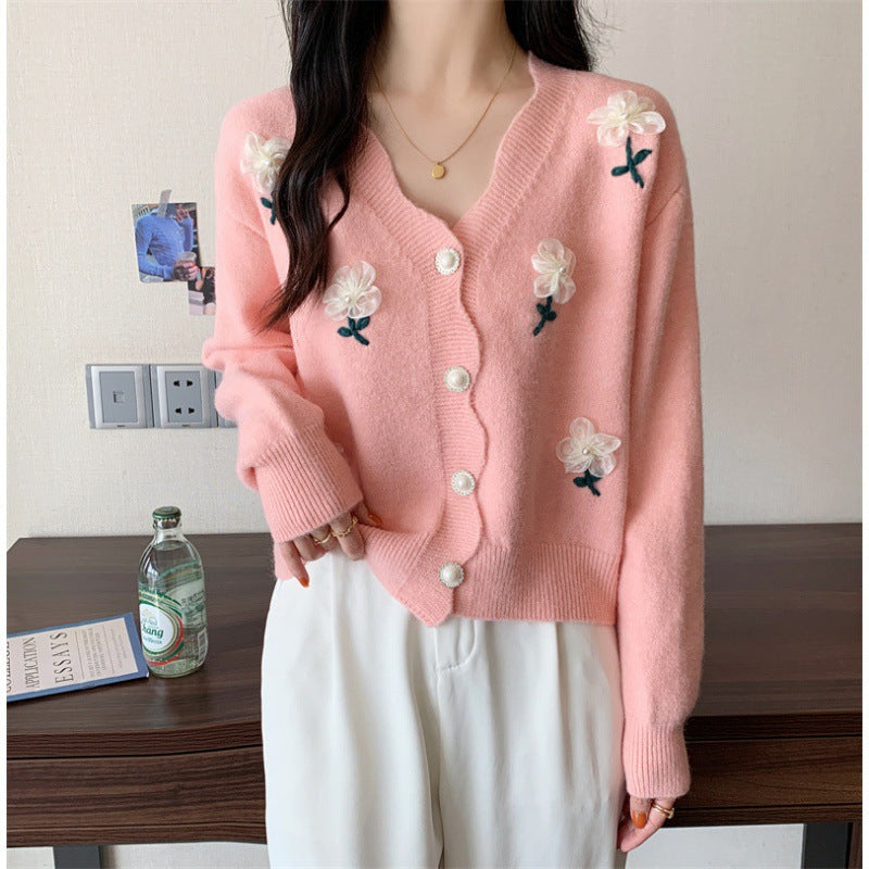 Bouton de cardigan féminin ludique avec broderie florale et boutons en perles Chic und Stil