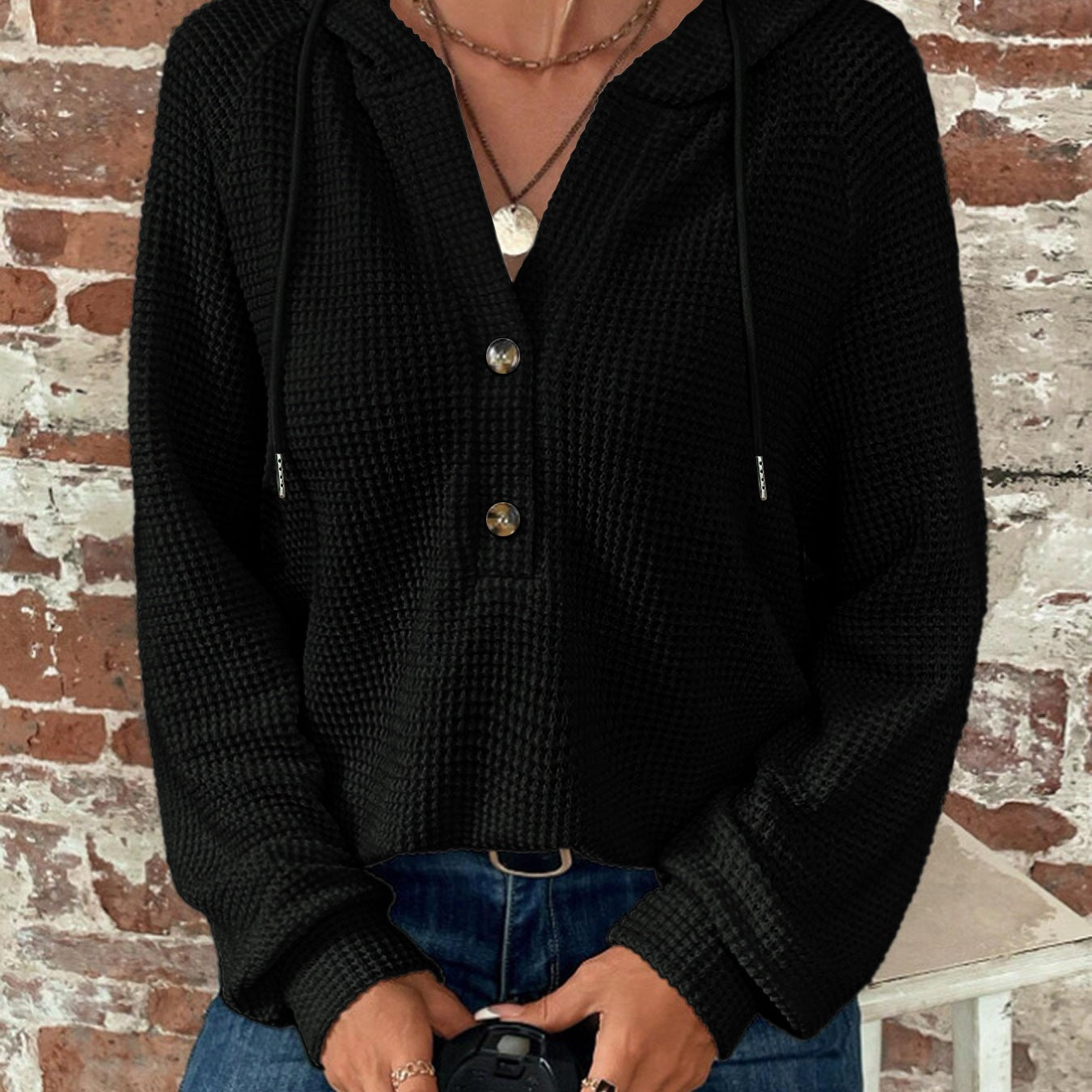 Pull à capuche décontracté pour femmes avec des détails en boutons et un tissu structuré Chic und Stil
