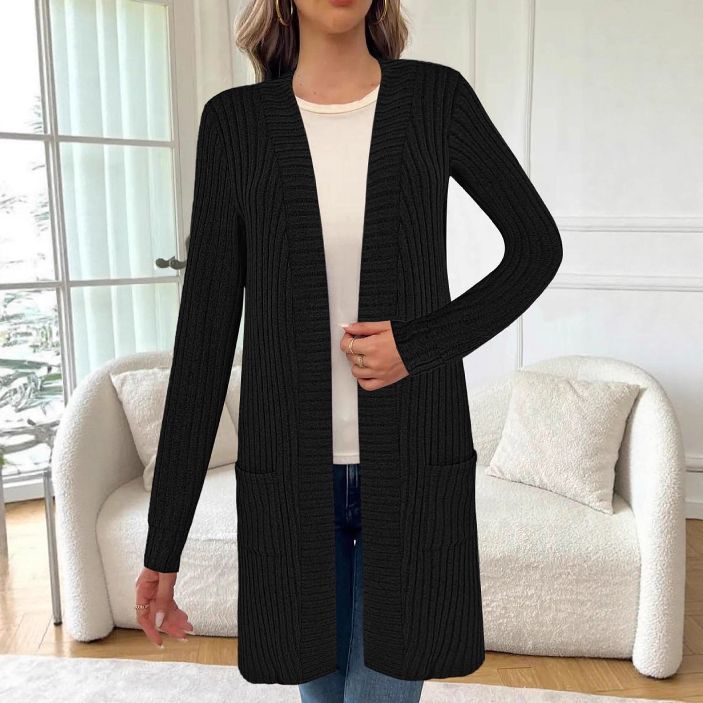 Veste tricotée longue pour femmes avec poches latérales et design texturé Chic und Stil