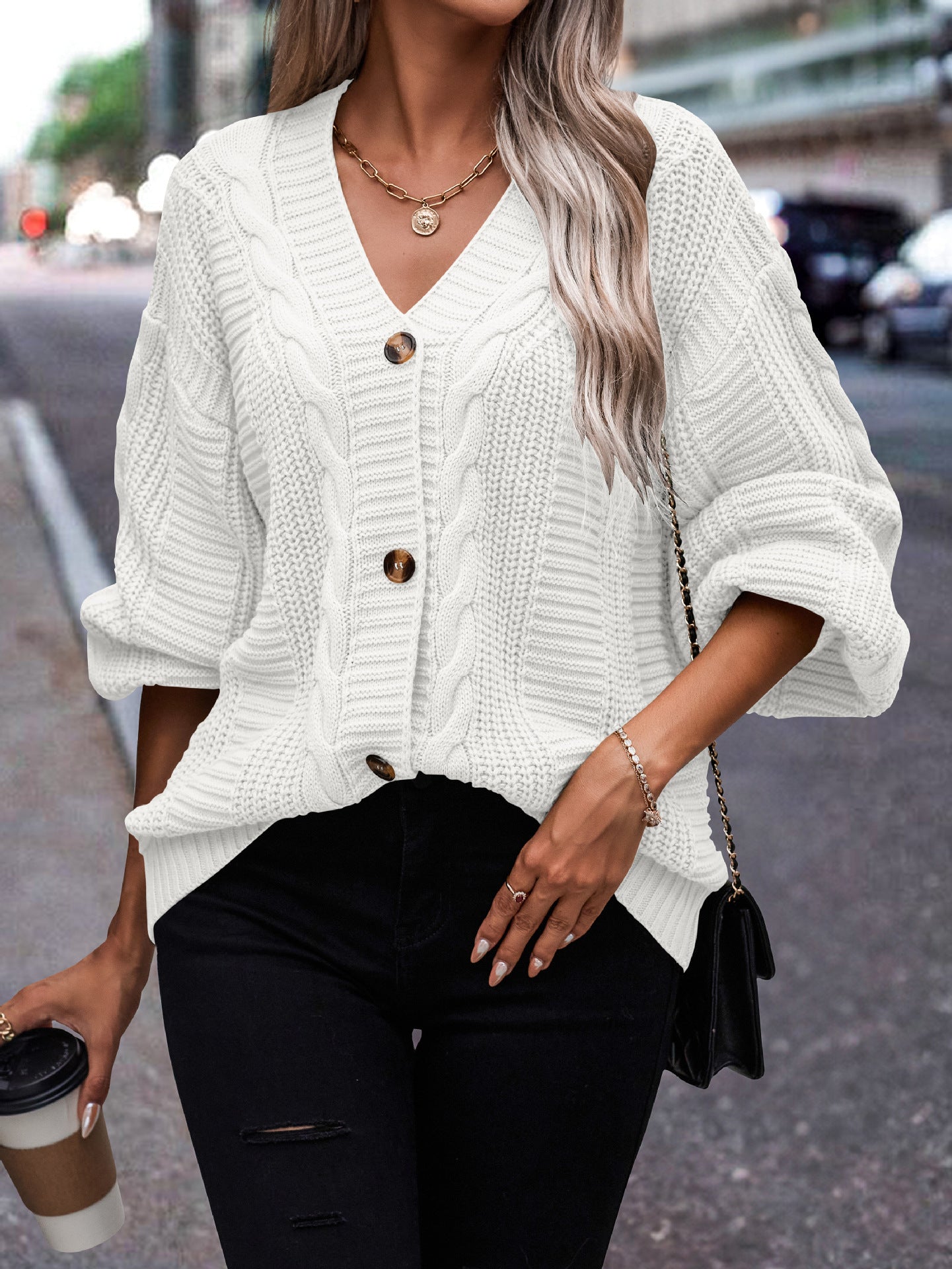 Cardigan en tricot à motifs en torsades pour femmes avec détail de bouton Chic und Stil