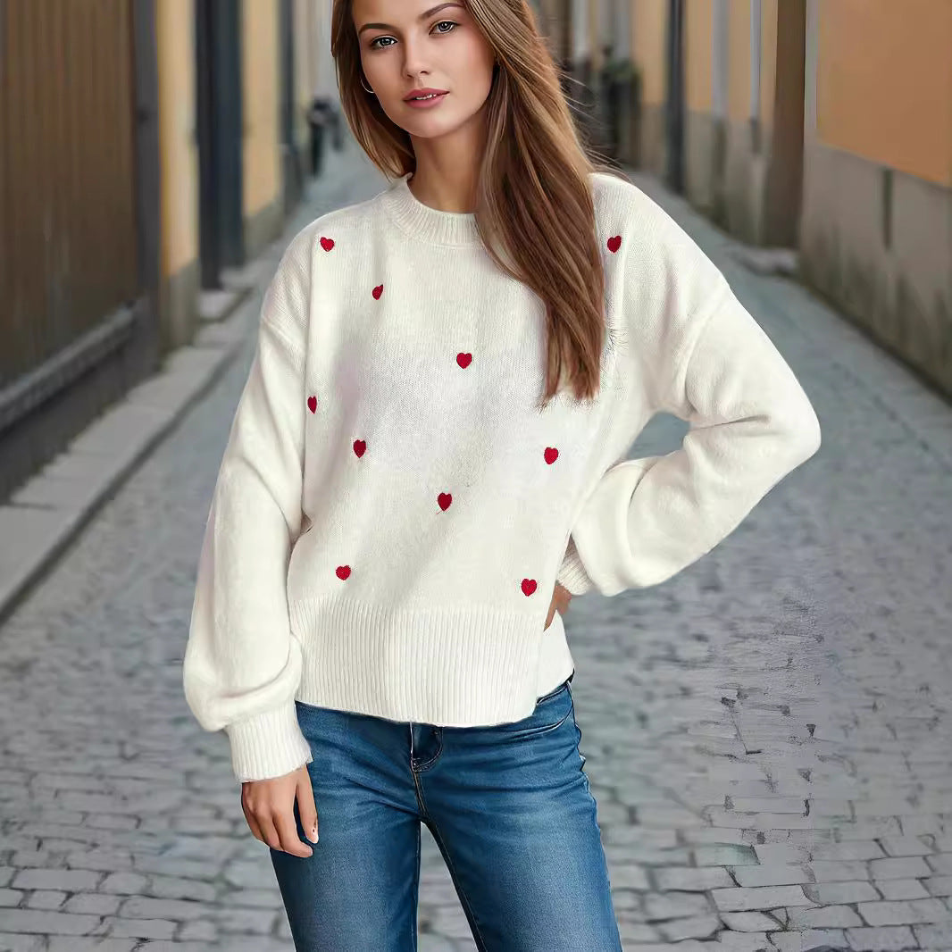Pull femme avec un design de cœur ludique Chic und Stil