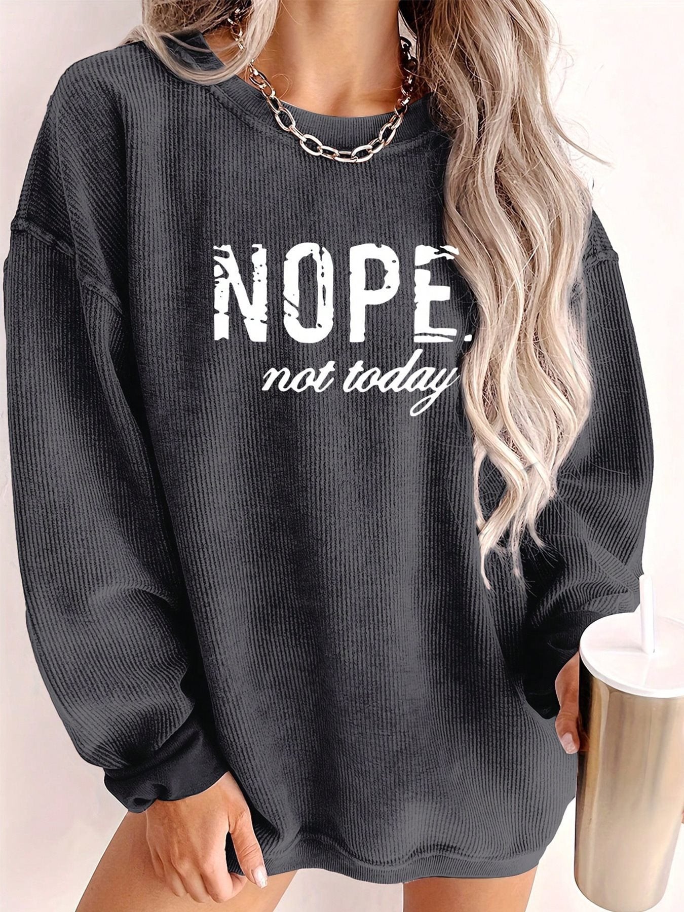 Pull oversized décontracté pour femmes avec impression statement et texture côtelée Chic und Stil