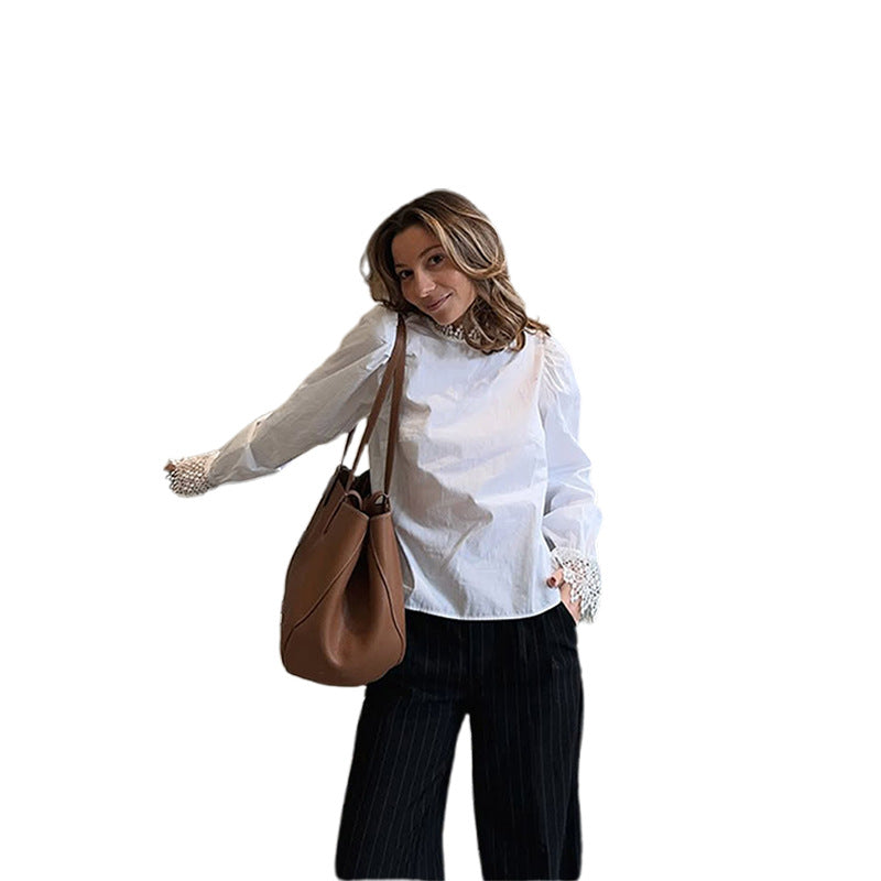 Chemisier pour femmes avec des accents de dentelle élégants et des manches bouffantes Chic und Stil