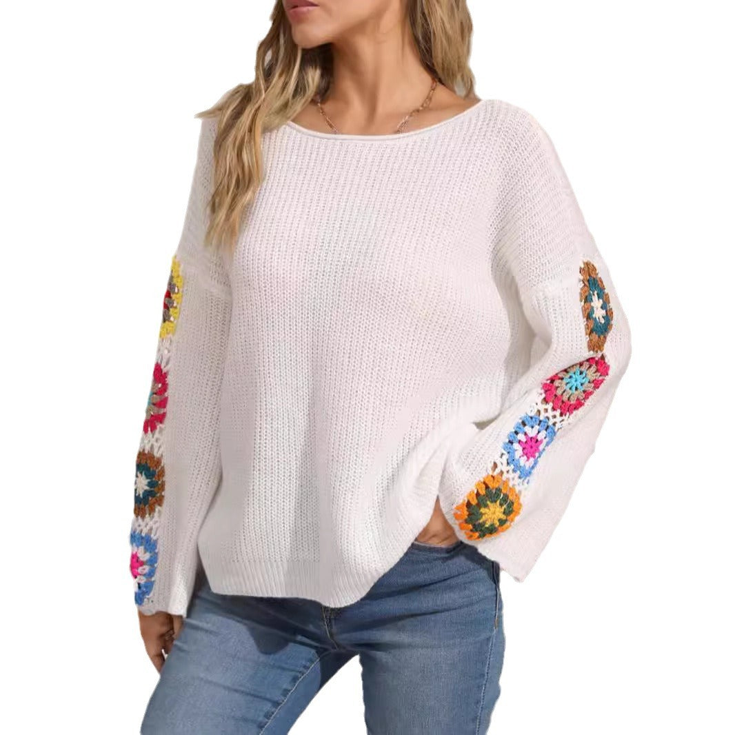 Pull en tricot rayé pour dames avec des applications de fleurs colorées Chic und Stil