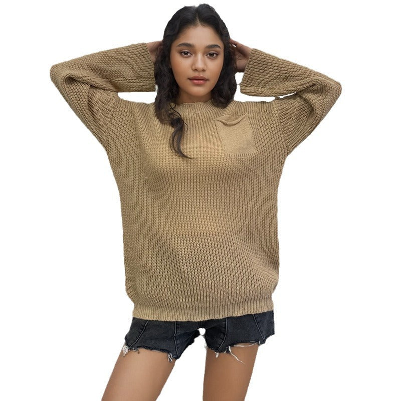 Sweat à col rond tricoté en gros mailles pour femmes avec une coupe décontractée et une poche pratique Chic und Stil