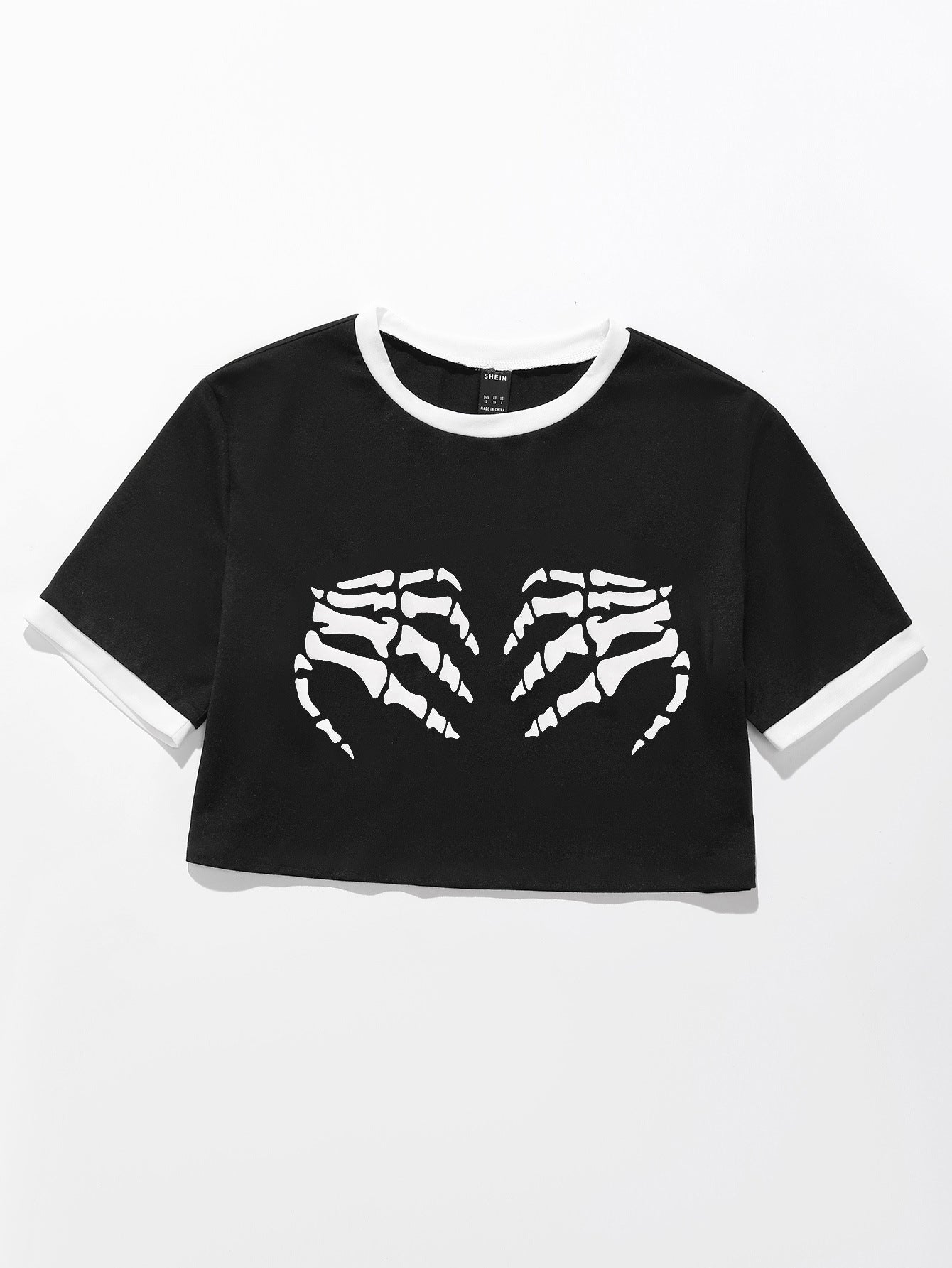 T-shirt cropped pour femmes avec motif de squelette et accents de manches contrastants Chic und Stil