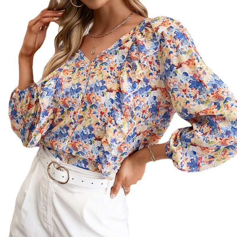 Women's blouse with ruffles and floral pattern Chic and Style