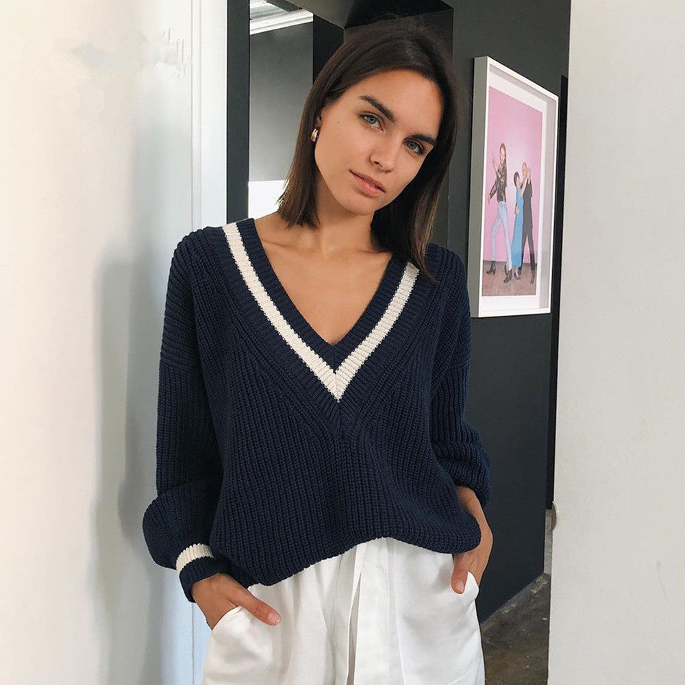 Pull femme à col en V avec des rayures contrastées Chic und Stil