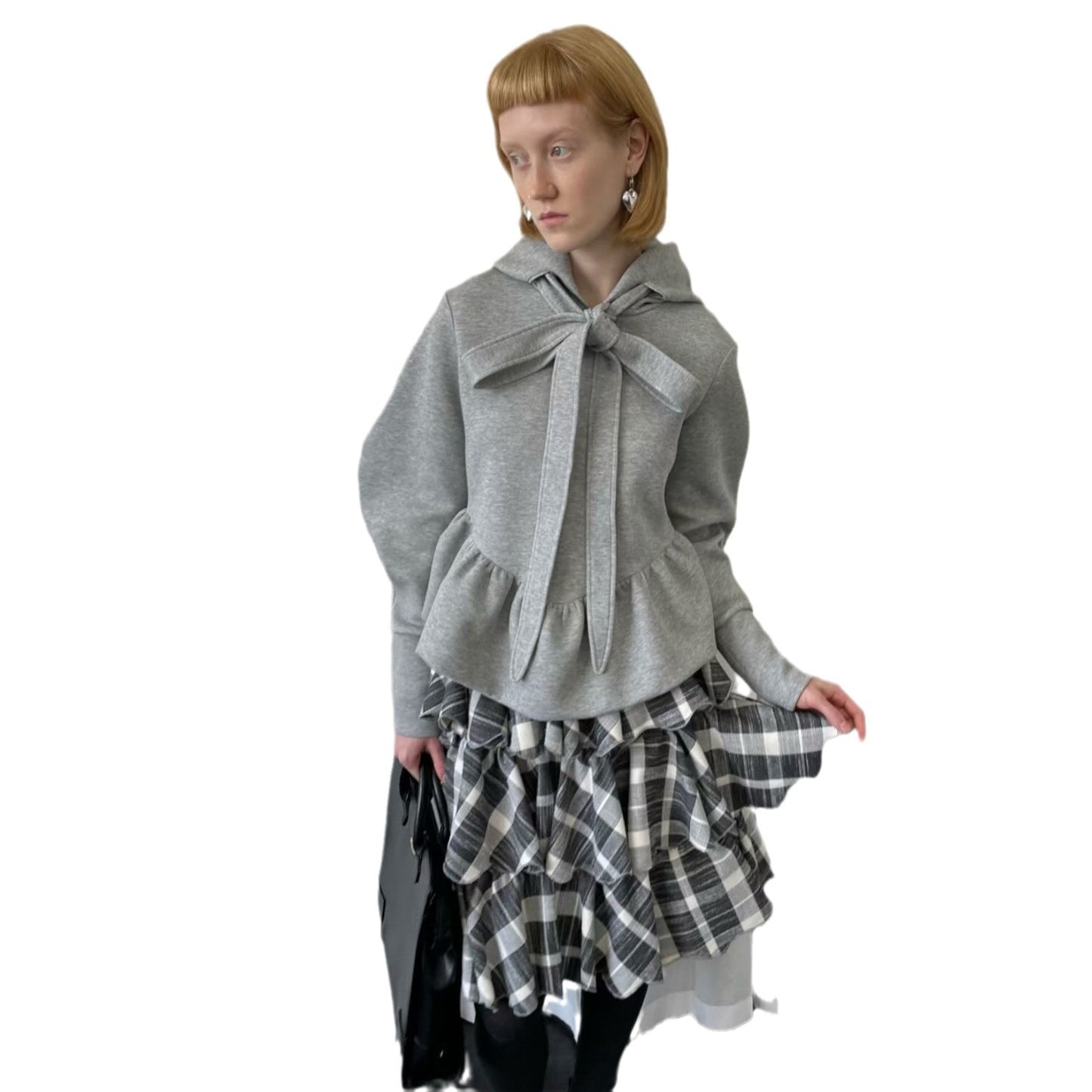 Pull femme avec détail de cravate et volants Chic und Stil