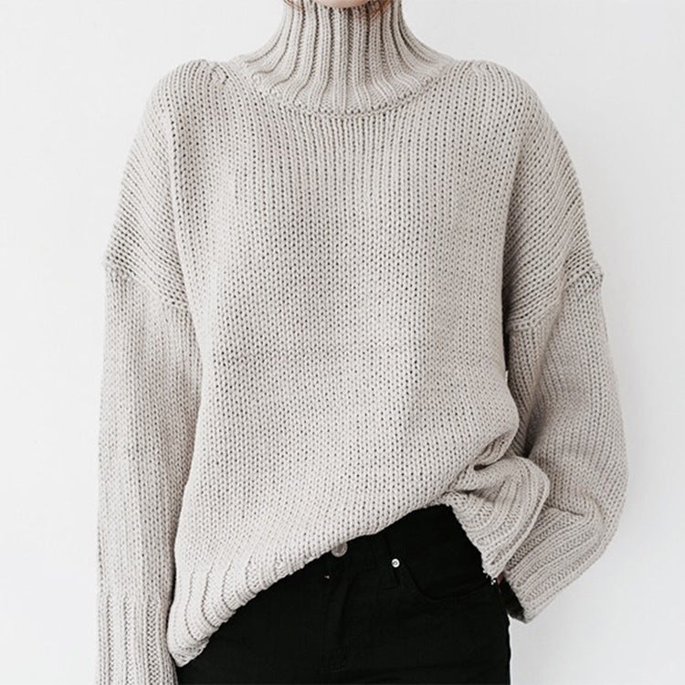 Ladies thick knit pullover with high collar and relaxed fit Chic and Style