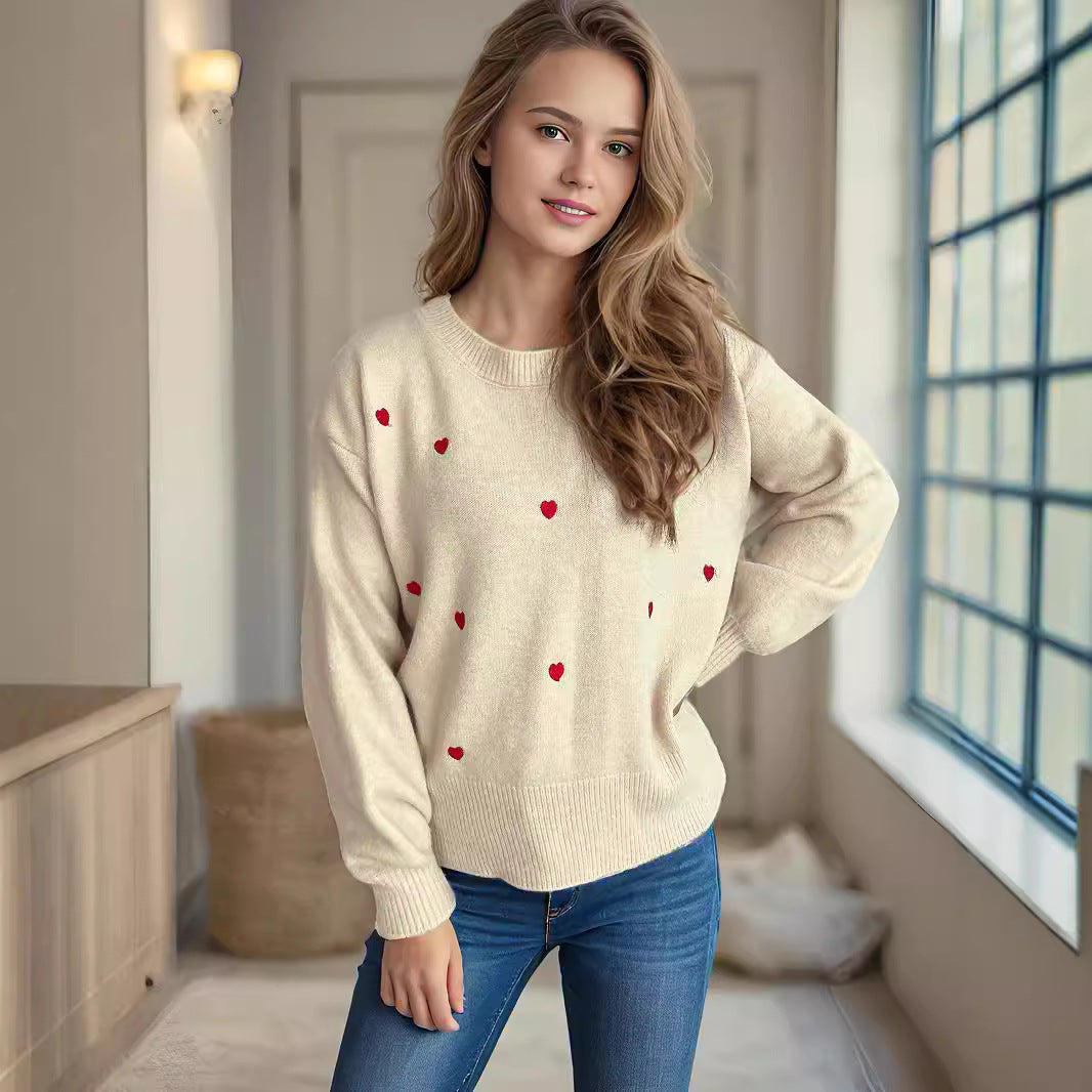 Pull femme avec un design de cœur ludique Chic und Stil