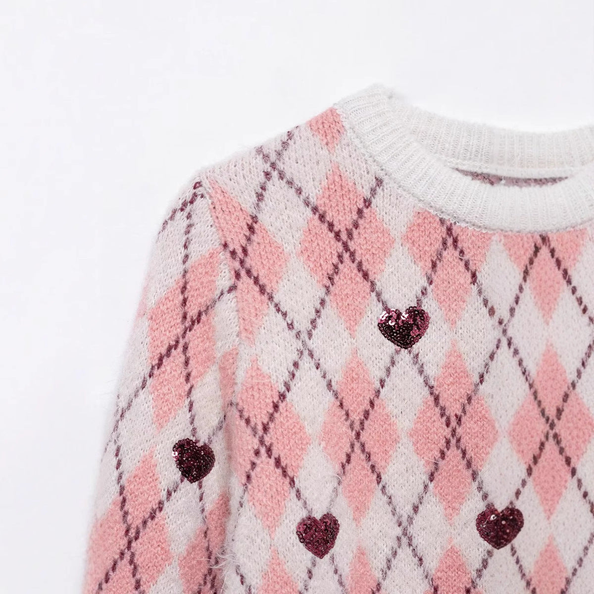 Pull femme avec motif en forme de cœur et éléments scintillants Chic und Stil