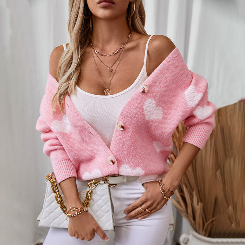 Veste en tricot mode pour femmes avec motifs de cœurs et boutons Chic und Stil