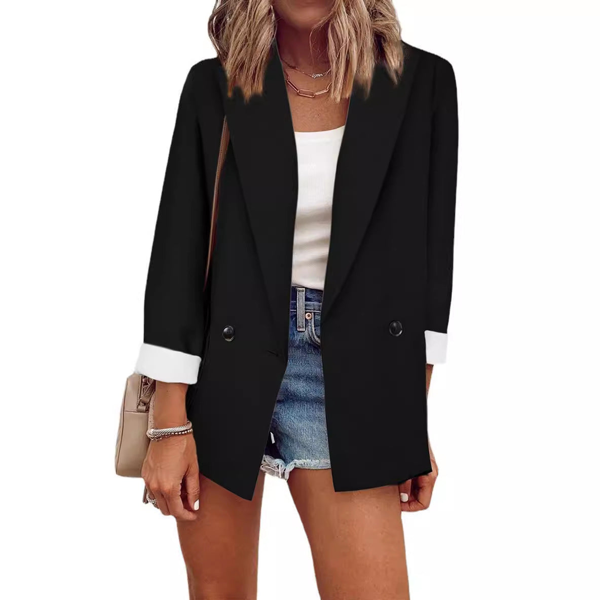 Veste oversized tendance pour femmes au design sobre avec des détails de boutons élégants Chic und Stil