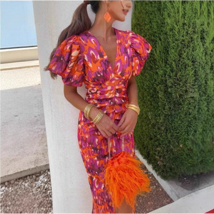 Robe de soirée cintrée pour femmes avec manches bouffantes et décolleté en V Chic und Stil