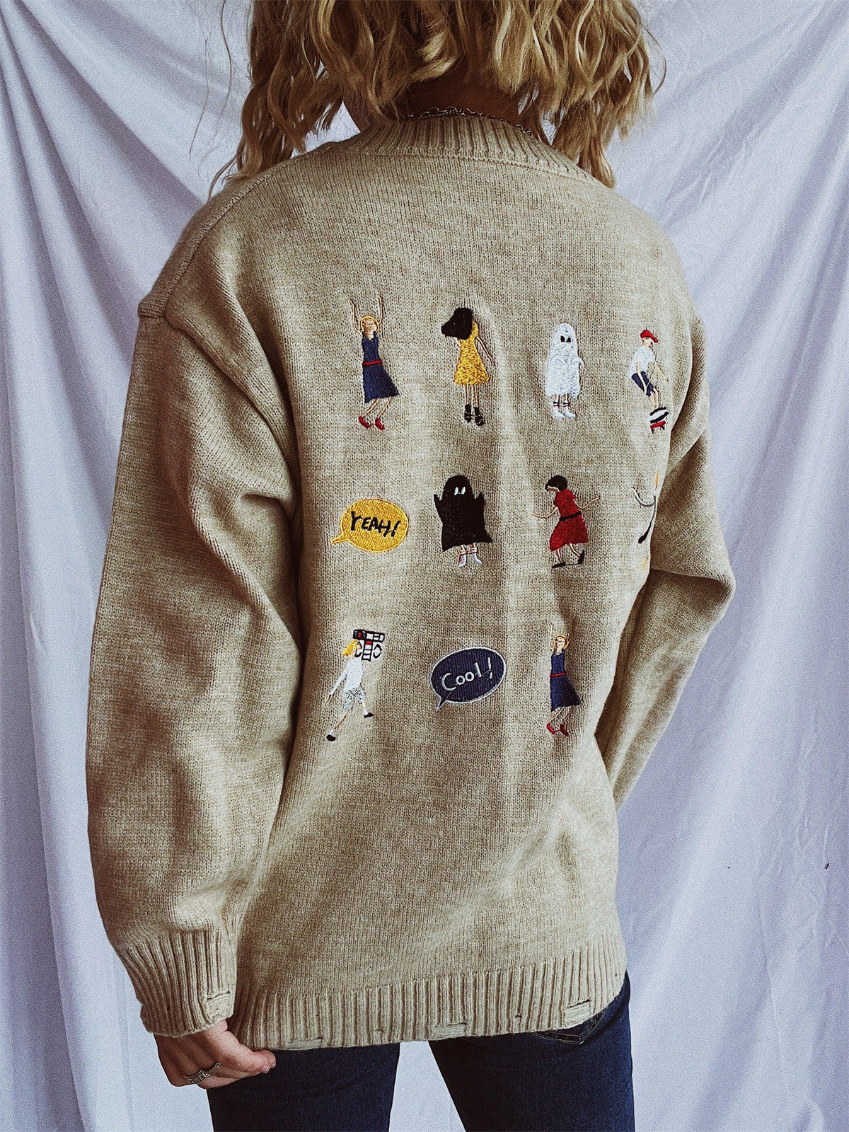 Pull femme avec motifs brodés colorés et coupe décontractée Chic und Stil