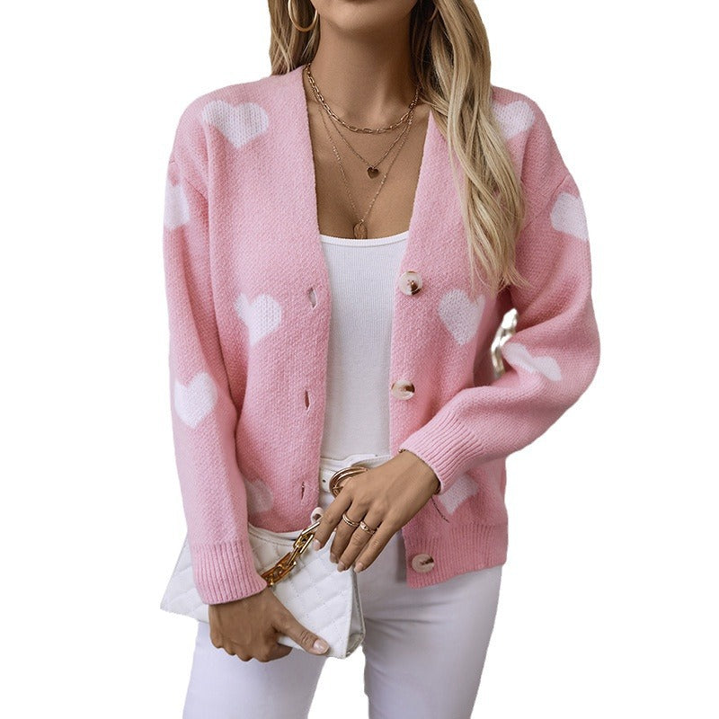 Veste en tricot mode pour femmes avec motifs de cœurs et boutons Chic und Stil