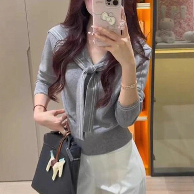 Pull femme élégant avec col à nœud et fine structure en tricot Chic und Stil