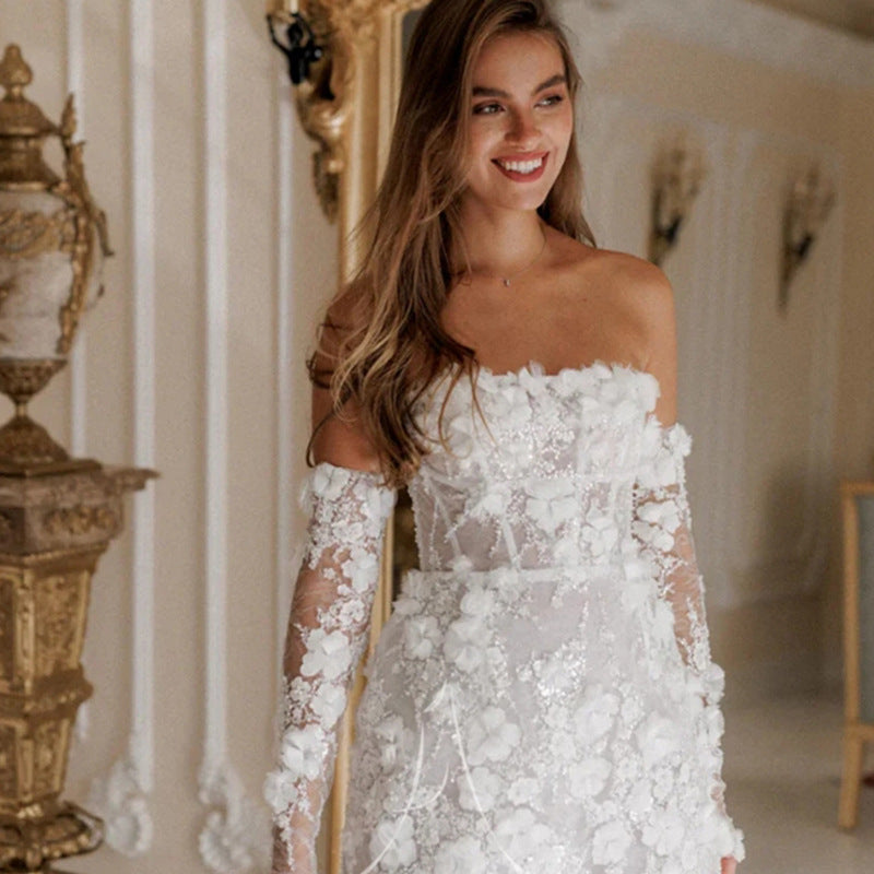 Dames Élégante robe maxi avec des applications florales et des manches transparentes Chic und Stil