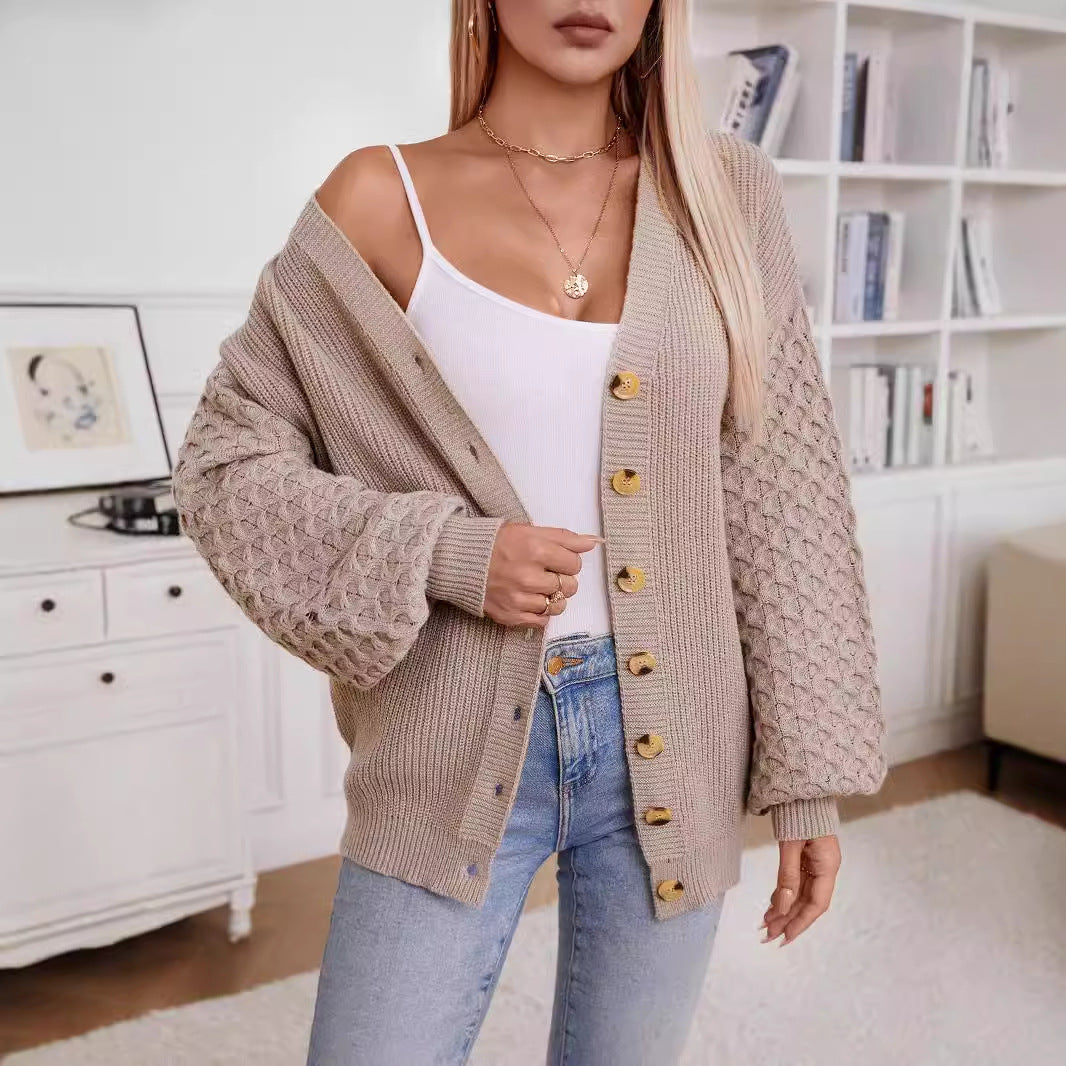 Veste en tricot pour femmes avec des manches texturées et des détails de boutons Chic und Stil