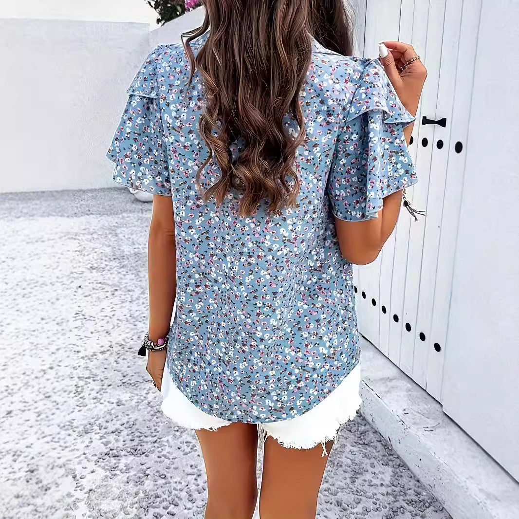 Chemisier femme avec des détails en volants floraux et décolleté en V Chic und Stil
