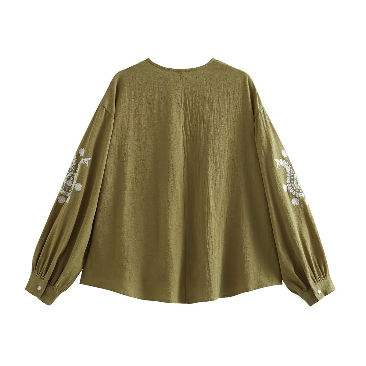 Blouse brodée pour femmes avec manches bouffantes et décolleté en V Chic und Stil