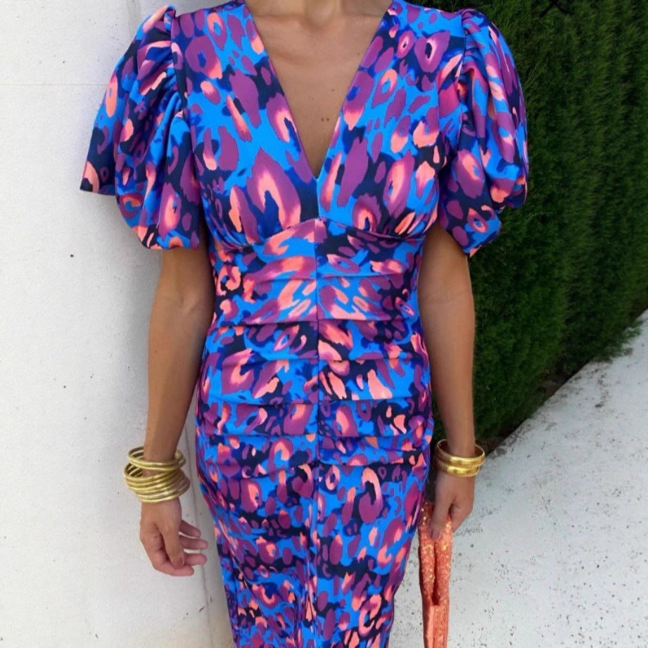 Robe de soirée cintrée pour femmes avec manches bouffantes et décolleté en V Chic und Stil