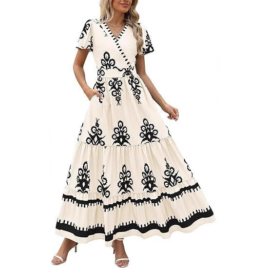 Robe maxi femme avec décolleté en V et détails de broderie contrastés Chic und Stil