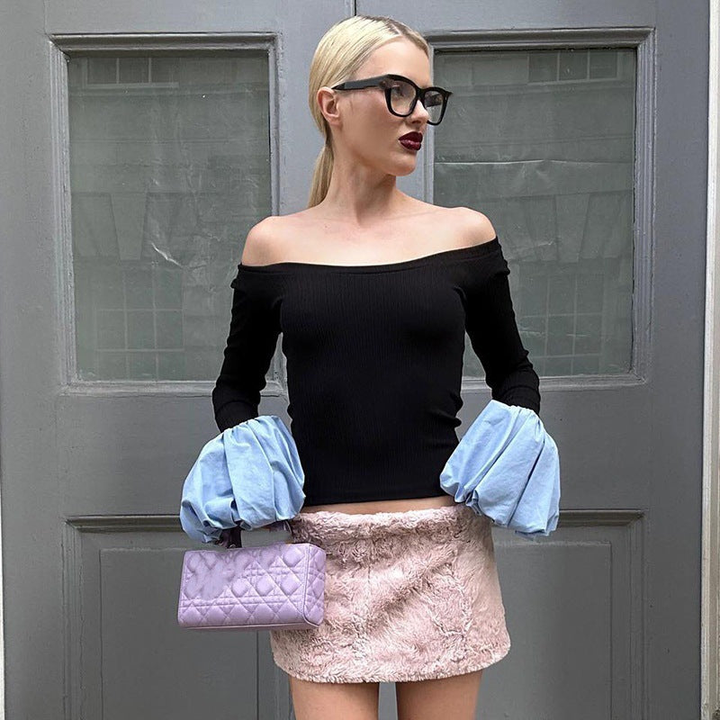 Dames Élégant haut avec une large zone d'épaule et de longues manches bouffantes Chic und Stil