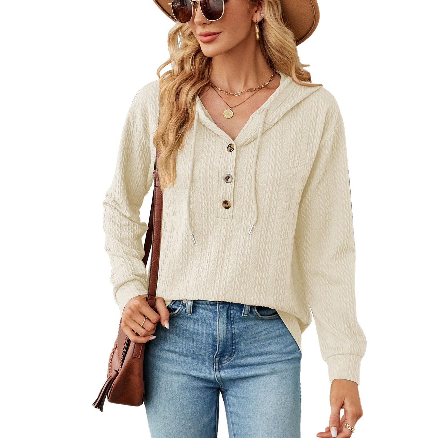 Pull à capuche décontracté pour femmes avec surface texturée et détails de boutons Chic und Stil