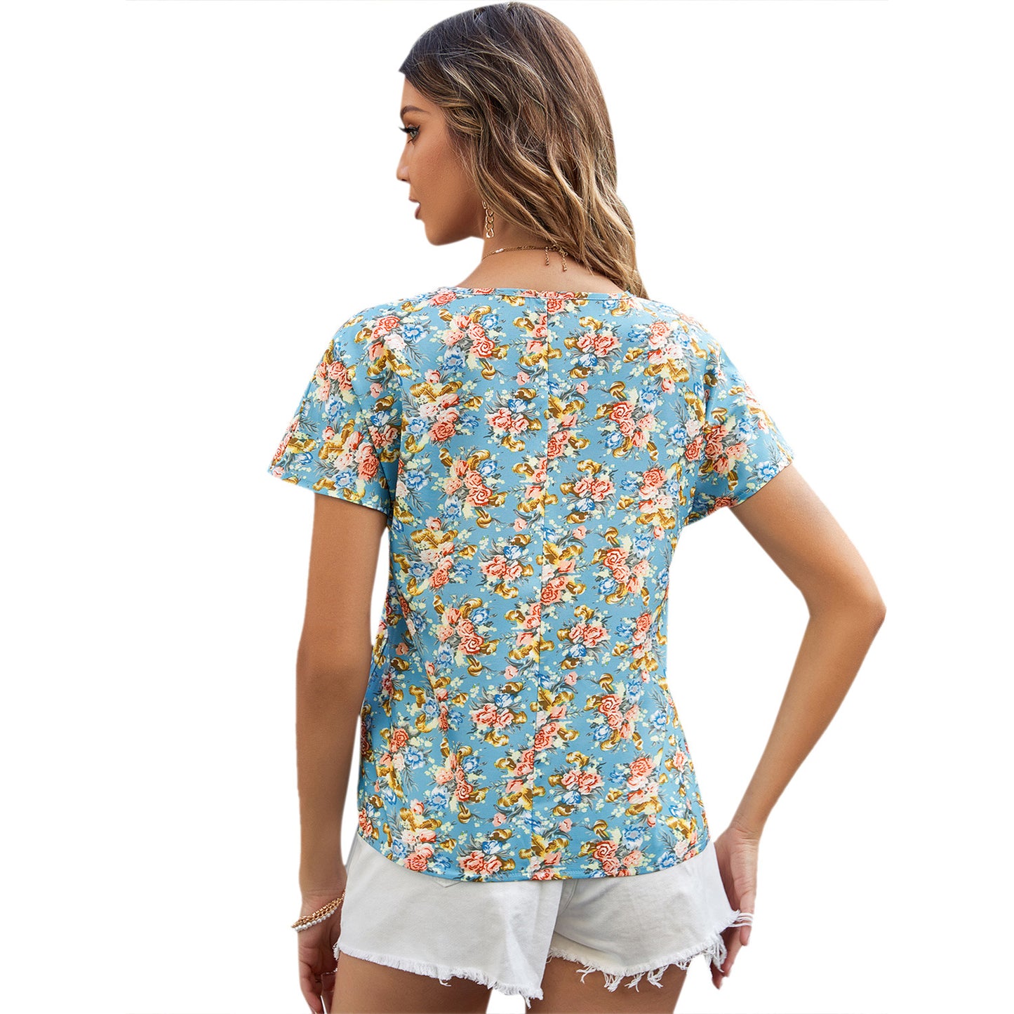 Top blouse pour femmes avec design floral et décolleté en V Chic und Stil