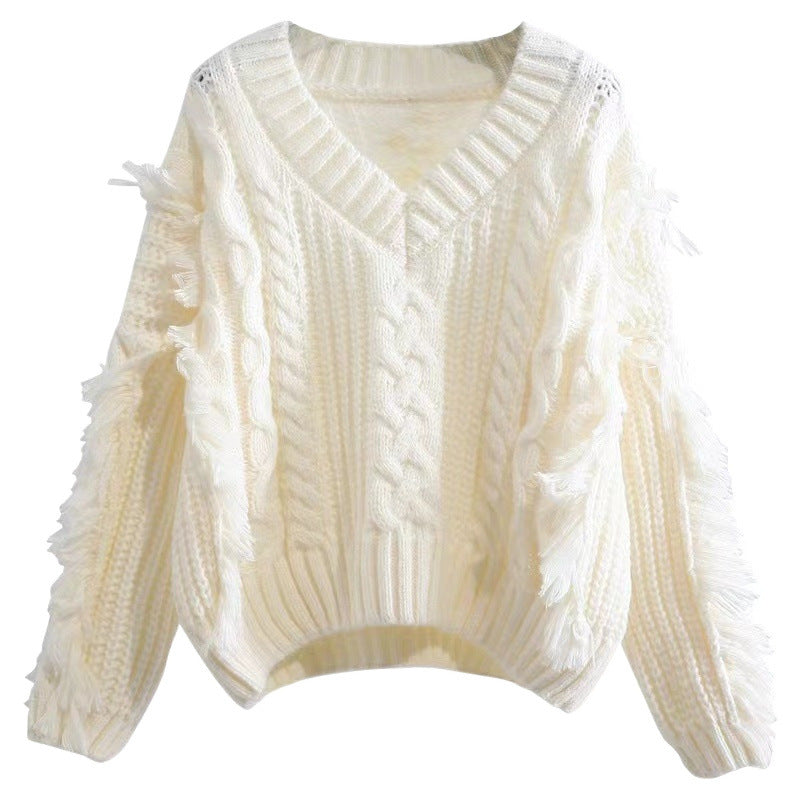 Pullover en tricot pour femmes avec des franges accrocheuses et un motif de torsades Chic und Stil