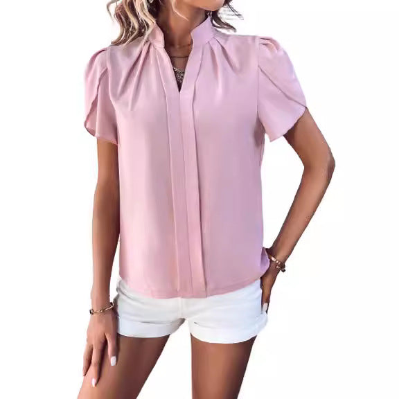 Chemisier pour femmes avec manches bouffantes et élégant boutonnière Chic und Stil